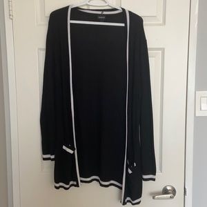 Black cardigan with white stripes